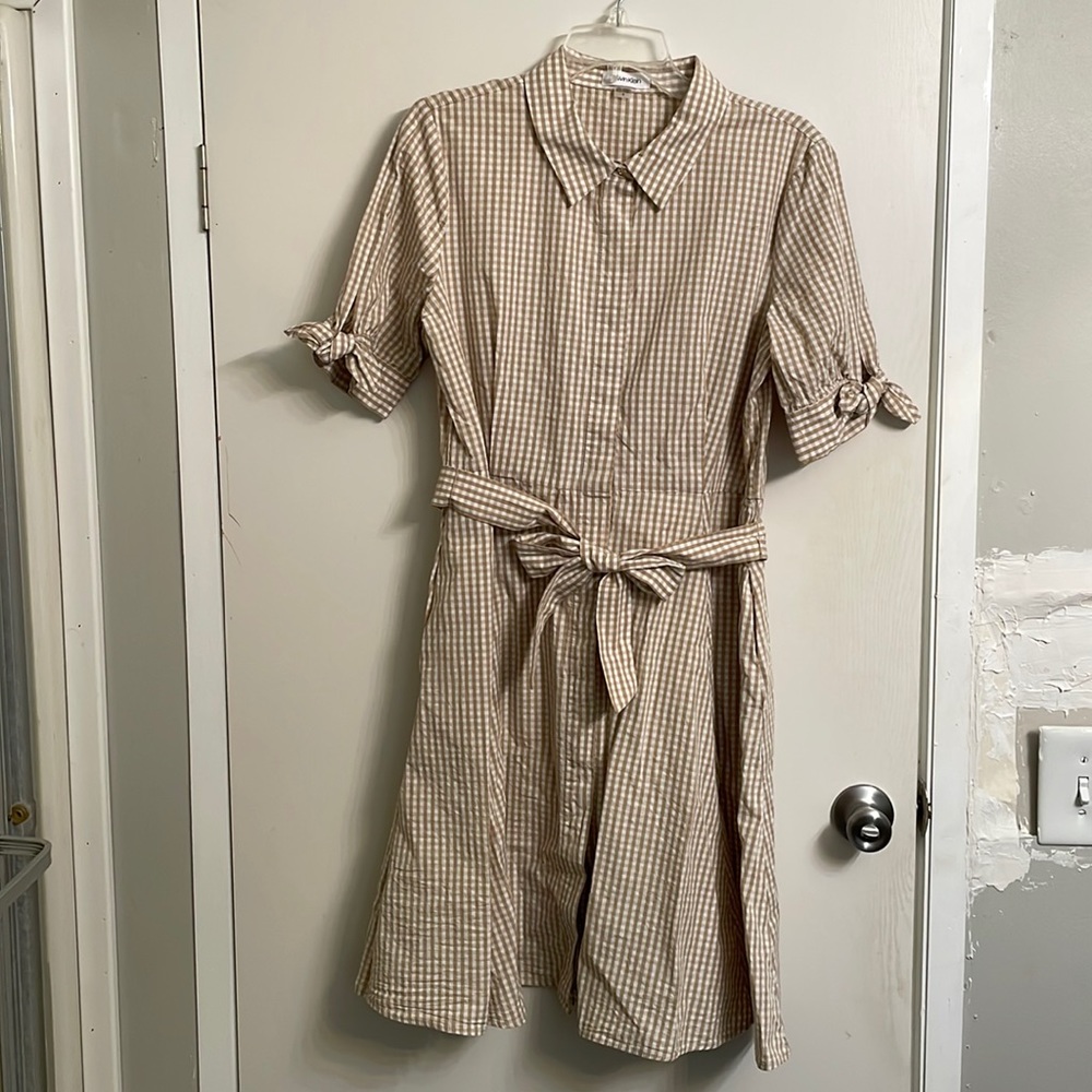 Calvin Klein midi length gingham grass with pockets.